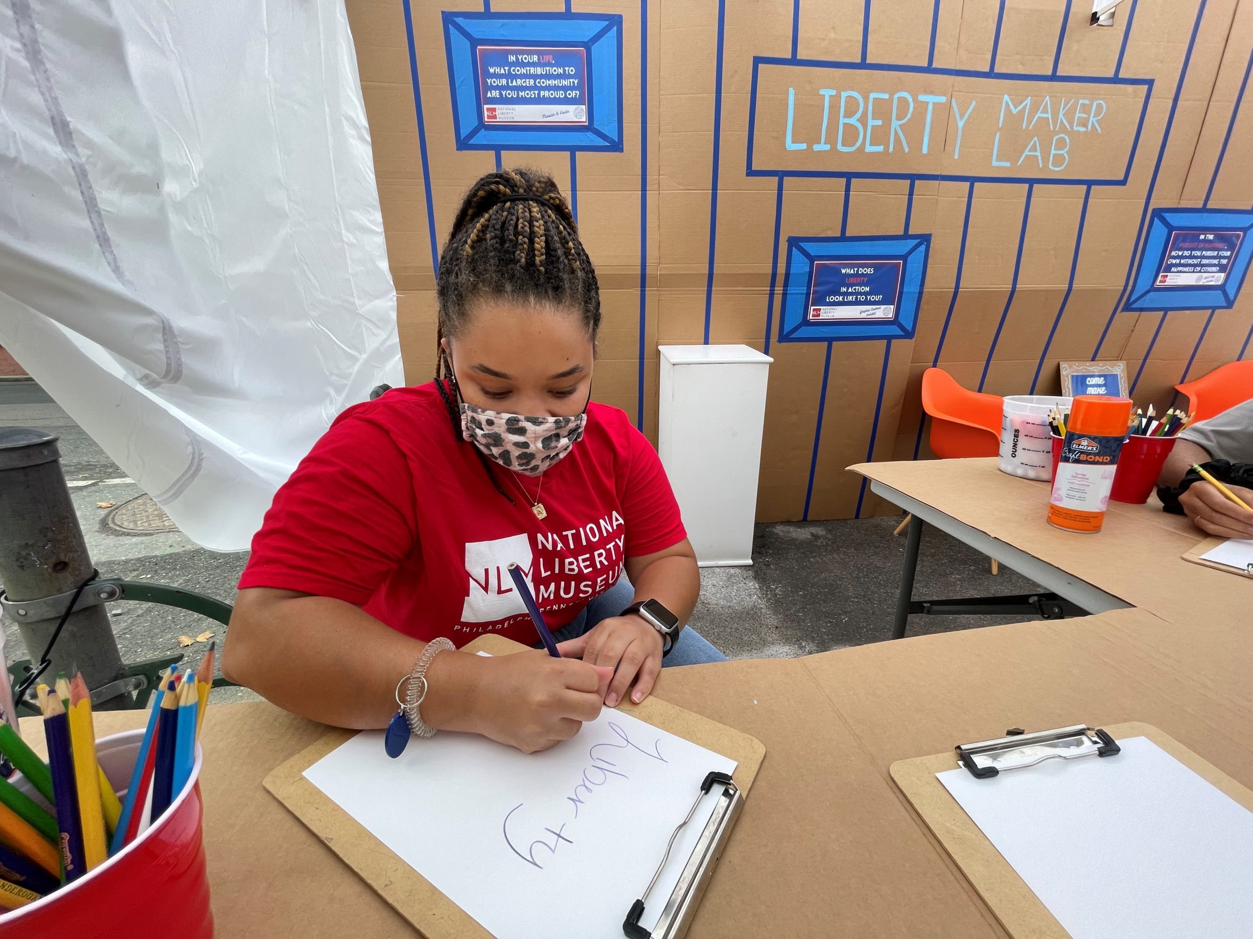 A museum educator hosts our Park(ing) Day event in 2021.